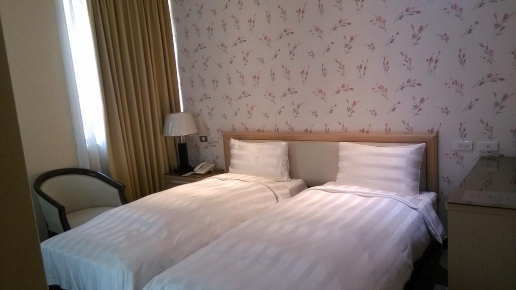 A Casa Hotel Taoyuan Cameră foto