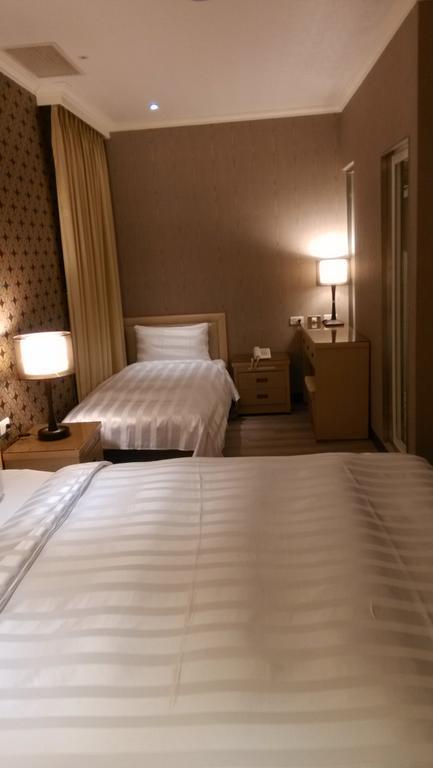 A Casa Hotel Taoyuan Cameră foto